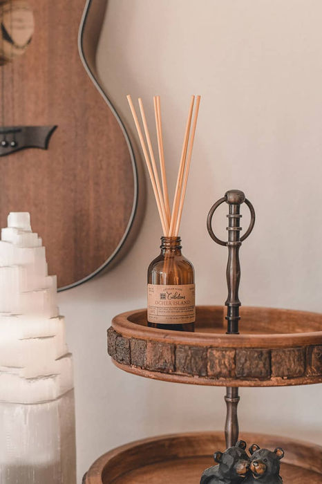 Reed diffuser and stand on wooden tray