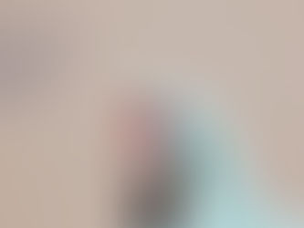 Gloved hand holds two blood vials, red and purple caps. Beige background with "KW Clinic" logo. Calm, clinical setting.