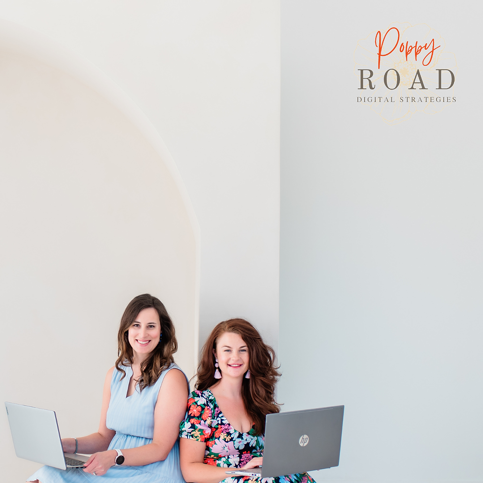 Two women with laptops sit against a light backdrop. One wears blue, the other floral. Smiling. "Poppy Road Digital Strategies" text in top right.