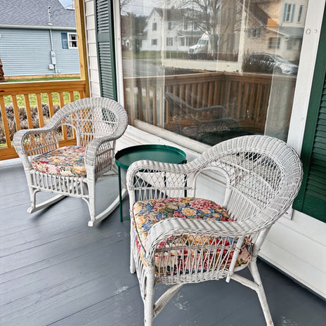 Two wicker pieces of furniture that sit on the front porch of the Lavender House on Liberty in downtown McConnelsville.