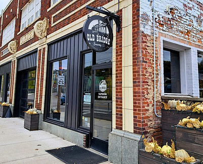 Front entrance of Old Bridge Brewing Company in McConnelsville, Ohio, welcoming guests for craft beer and local dining.