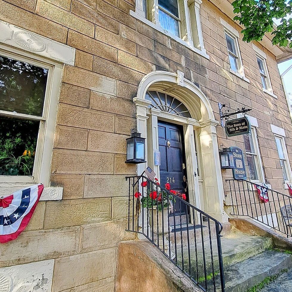 Exterior of The Inns at 8th and Main in historic McConnelsville Ohio, a boutique stay for exploring The Wilds and Southeast Ohio.