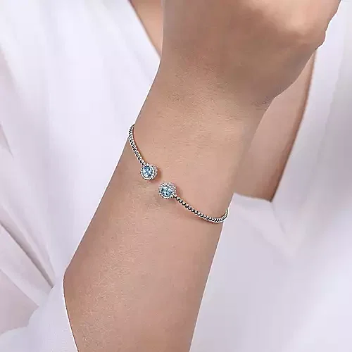 Thumbnail: 14K White Gold Round Sky Blue Topaz and Halo Bujukan Bangle