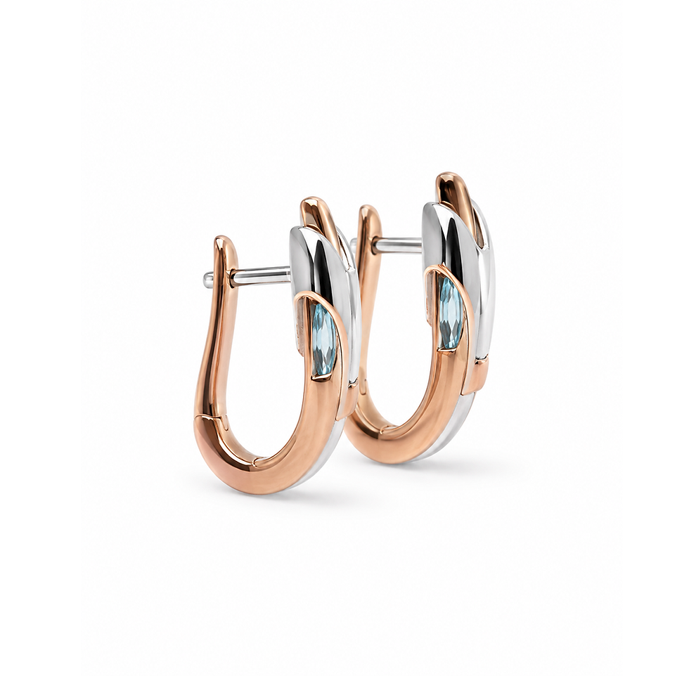 Thumbnail: Breuning Blue Topaz Huggie Earrings in Silver and Rose Gold Plating
