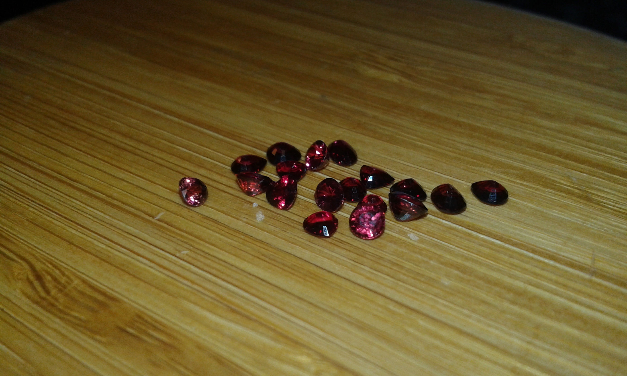 Super sparkly mixed shape untreated red sapphires - pear, trilliant, oval+ more