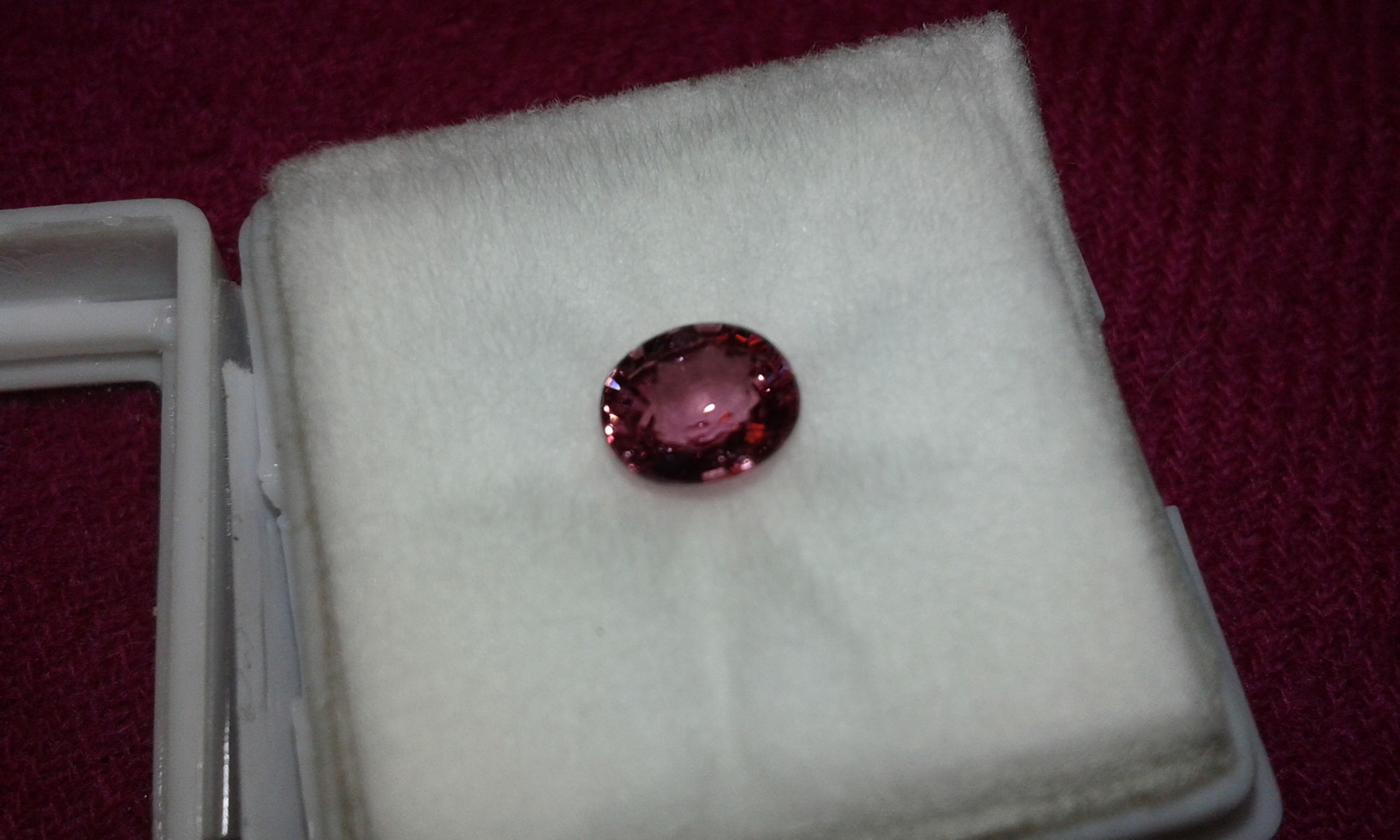 Low heat treatment only 0.89ct oval faceted Earth mined loose red sapphire