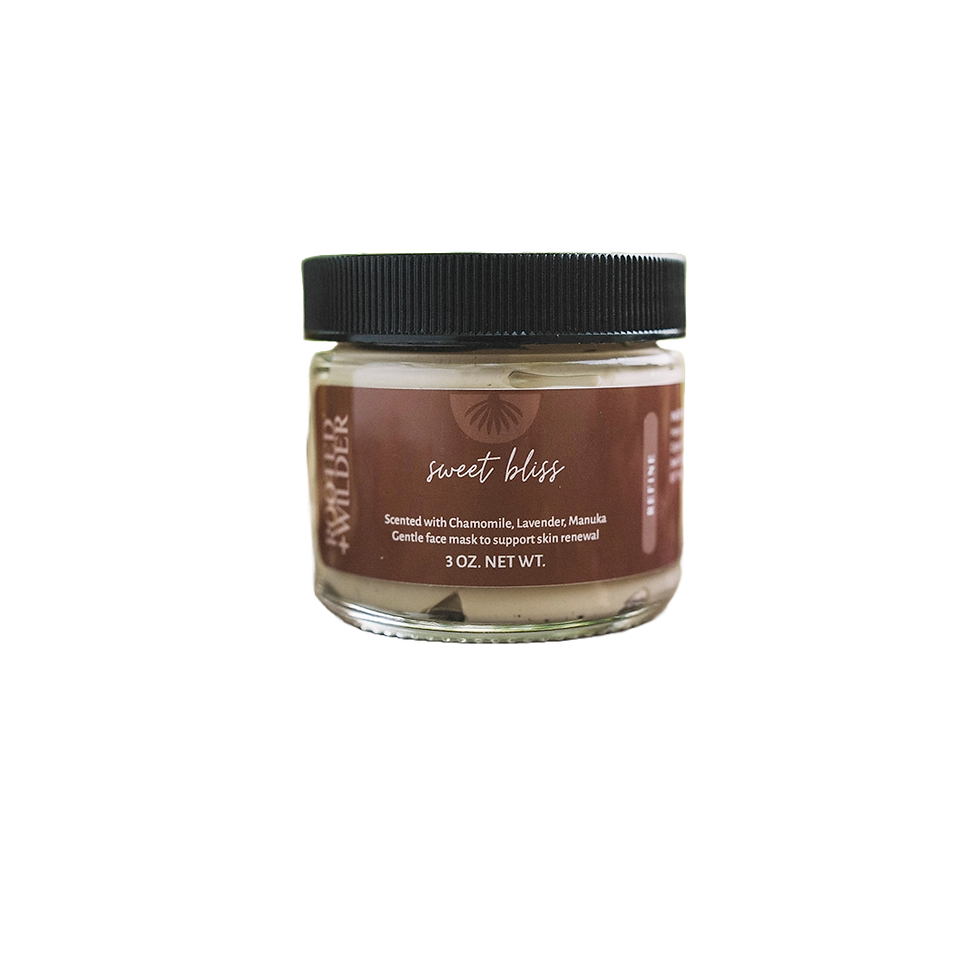 A 2oz clear glass jar, topped with black plastic lid, and filled with clay mask