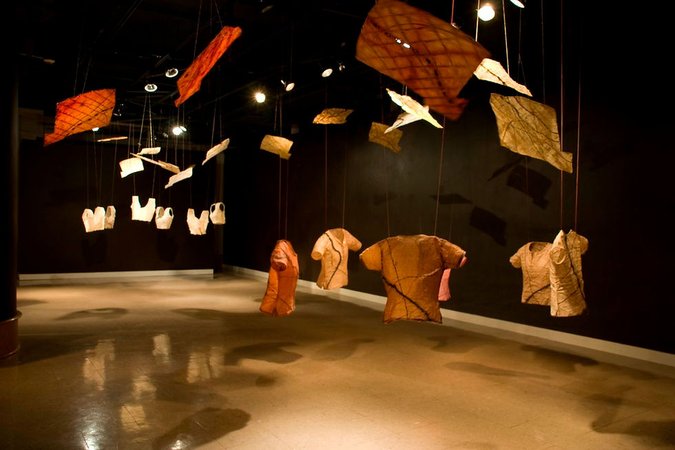 Anti-memorial to the 1947 Indian Partition, "Remembering the Crooked Line" art exhibition by Pritika Chowdhry, closer view of the kurtis, cholis, and kites.