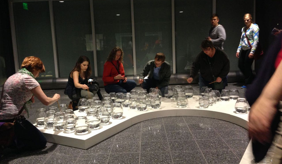 Strangers playing and creating music together, at the Northern Spark Festival, Minneapolis, MN.