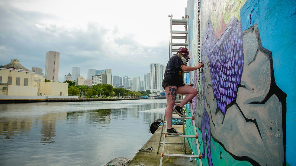 Resident artist Grace the Miami River mural