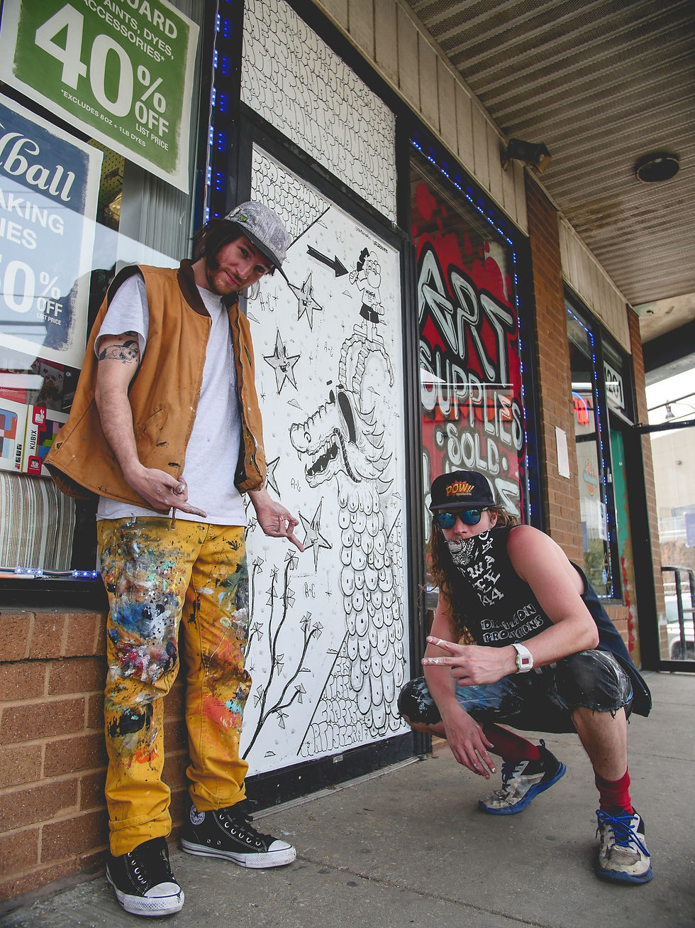 Directors Ramiro & Jonathan in front of the A&C mural