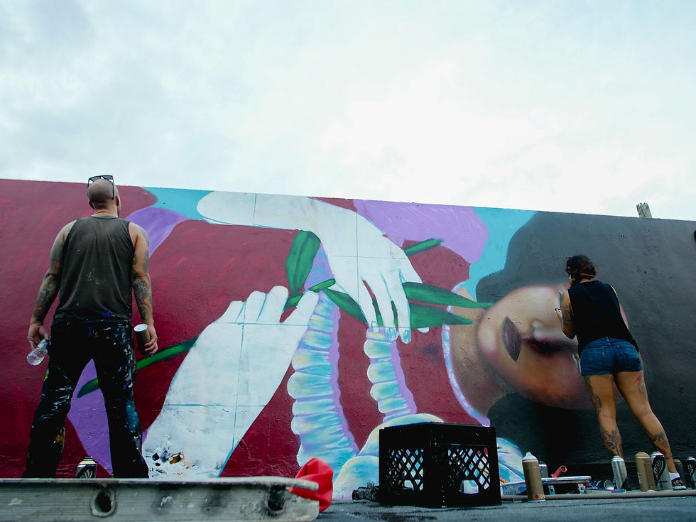 Resident artist Nicole & local collaborator Chuck Berrett Wood Tavern mural