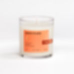 Glow Together Gratitude candle in clear glass with warm orange label, eucalyptus sea salt and water flowers scent