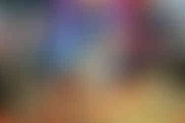 Models, exhibitors, and vendors on the WPPI expo floor