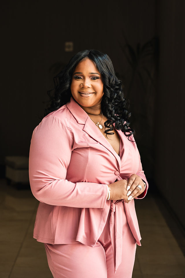 Three-quarter headshot of Regina Moore during her Moore Life Travels personal branding session in New Orleans.