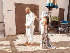 bride taps groom for the first look