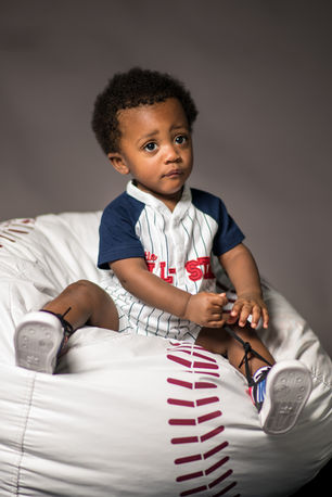 Toddler photography in New Orleans. Baseball Sports theme.