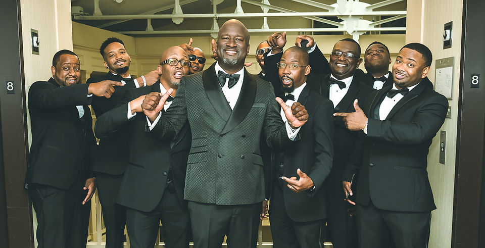 Groom and groomsmen preparing for the New Orleans wedding ceremony
