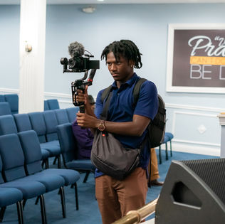 Cameron Populis filming a New Orleans wedding with a gimbal for Chad Populis Photography
