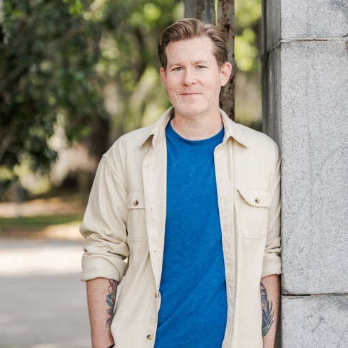 Personal branding photo of an entrepreneur walking through New Orleans City Park