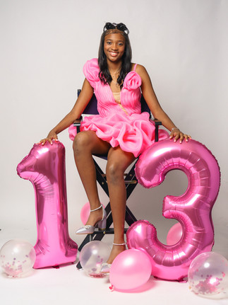 13th birthday captured with creative props