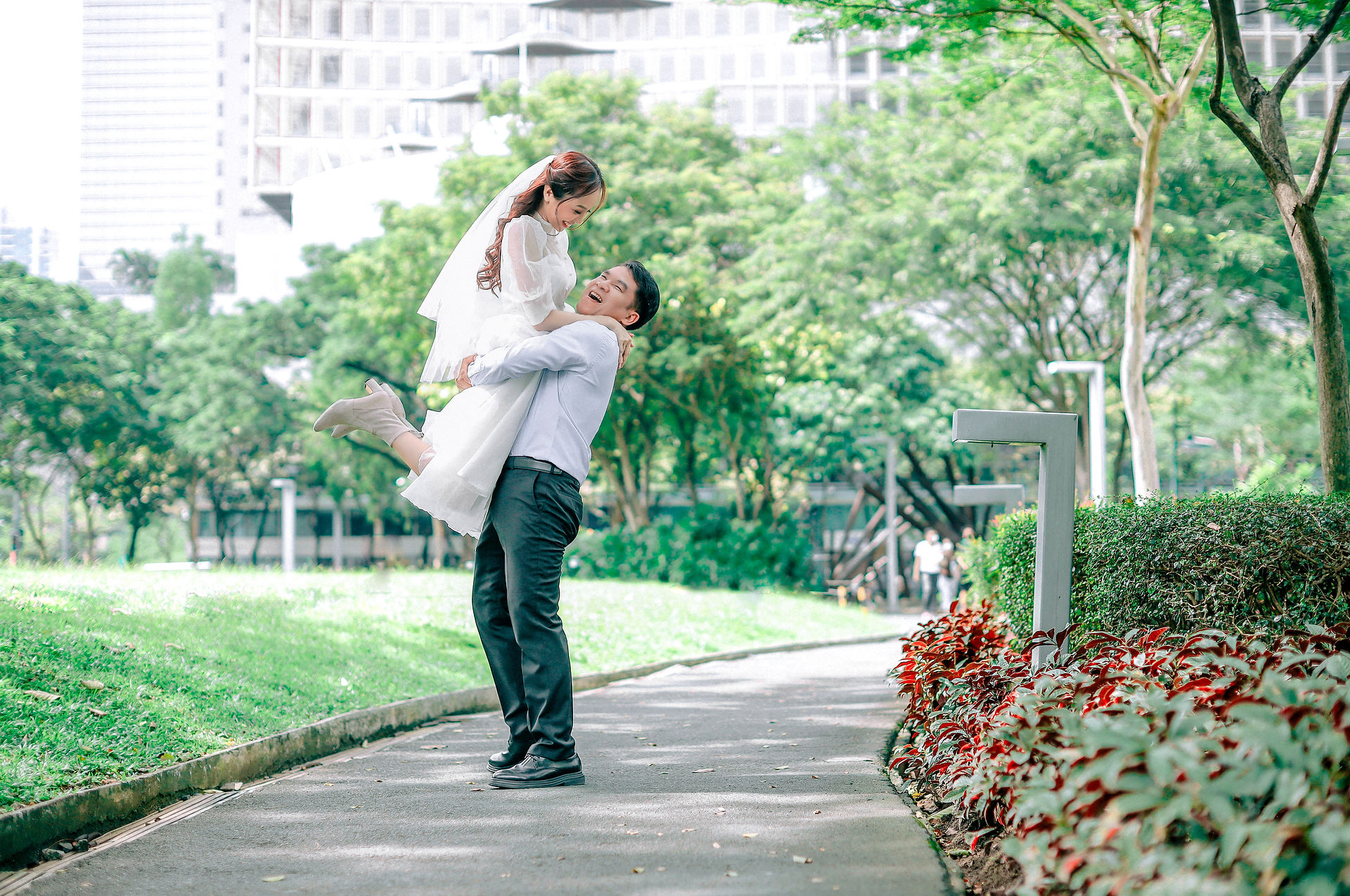Wedding couple action pose lift
