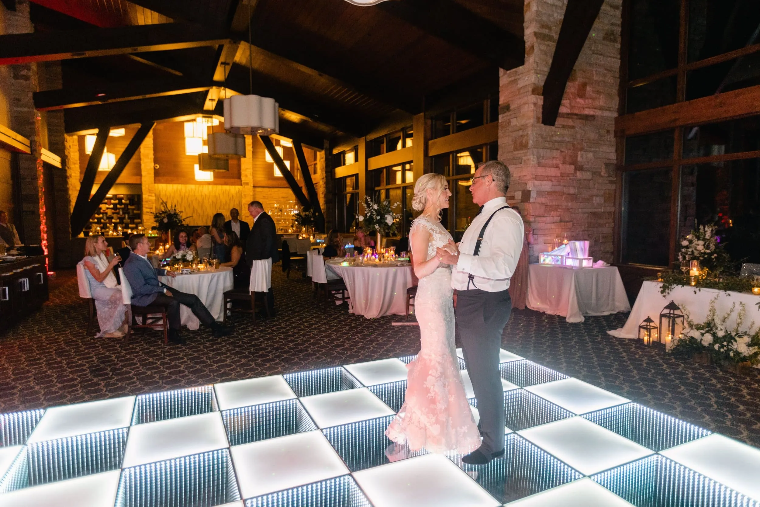 Father -daughter dance. New Orleans wedding dance floor rental - 3D LED RGB mirror lightup dance floor