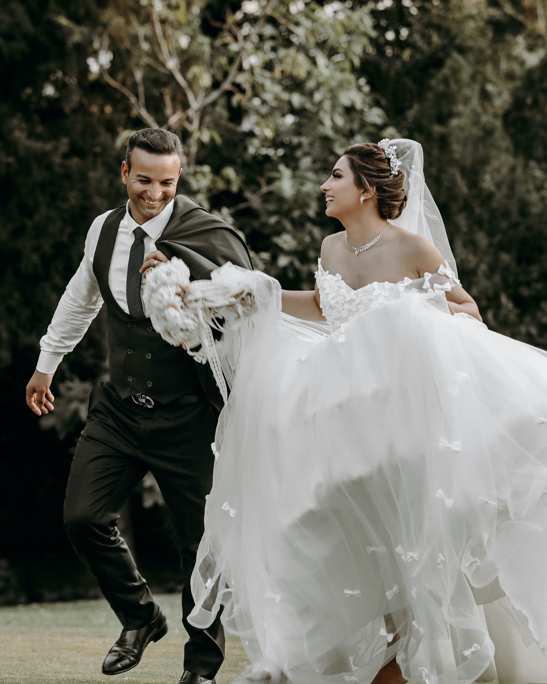 Wedding couple running pose