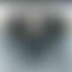 groom and groomsmen pose for portraits