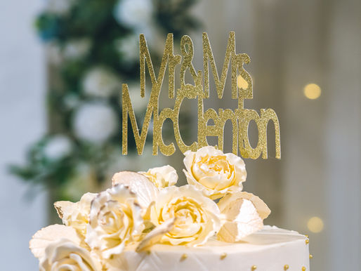Mr. and Mrs. McClenton wedding cake topper celebrating Jervis and Marquita’s marriage.