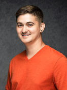 National meeting attendee photographed at a professional headshot station