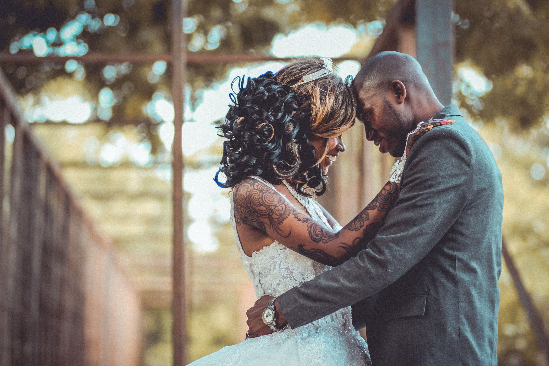 Wedding couple intimate head cuddle pose