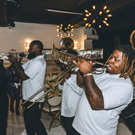 Brass band at NOLA Skyline play during wedding reception