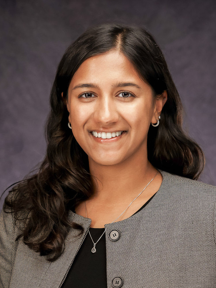 Professional headshot of a woman in New Orleans showcasing confident expression, natural skin tones, and polished portrait lighting.
