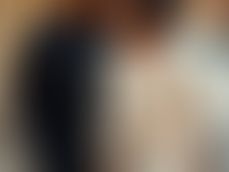 New Orleans engagement session, couple wearing one polished outfit look and one relaxed outfit look, light breathable fabrics, natural movement, romantic editorial photography, warm soft light, historic city background