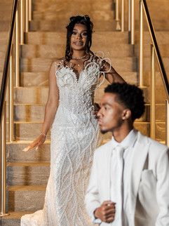 Stylish prom portraits with urban night lighting and reflections