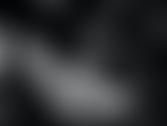 Black and white photo of hands typing on a keyboard