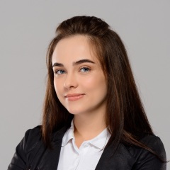 young-beautiful-woman-smiling-posing-purple-wall 1