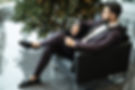 man sitting on black sofa chair while watching watch_edited.jpg