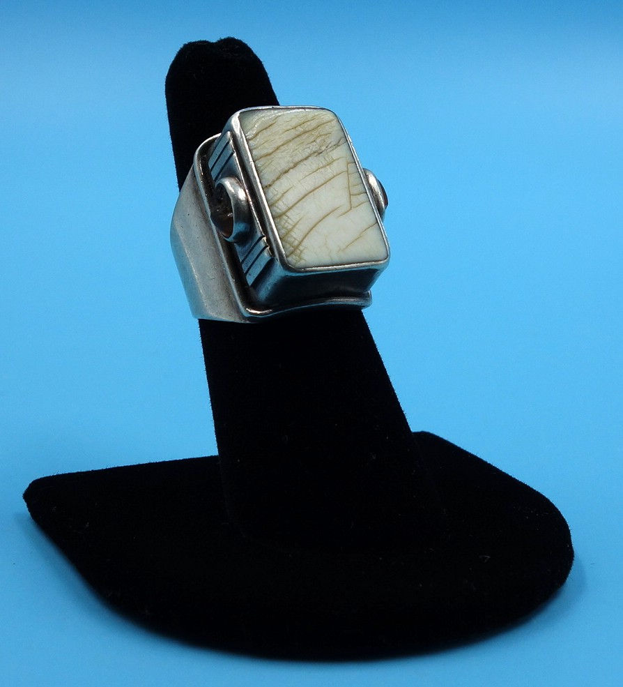 Striking men's ring with bone inlay