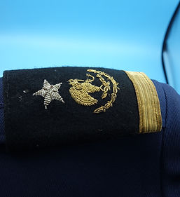 Grouping of authentic Mexican military uniforms, insignia, photographs named to Father and Son Generals