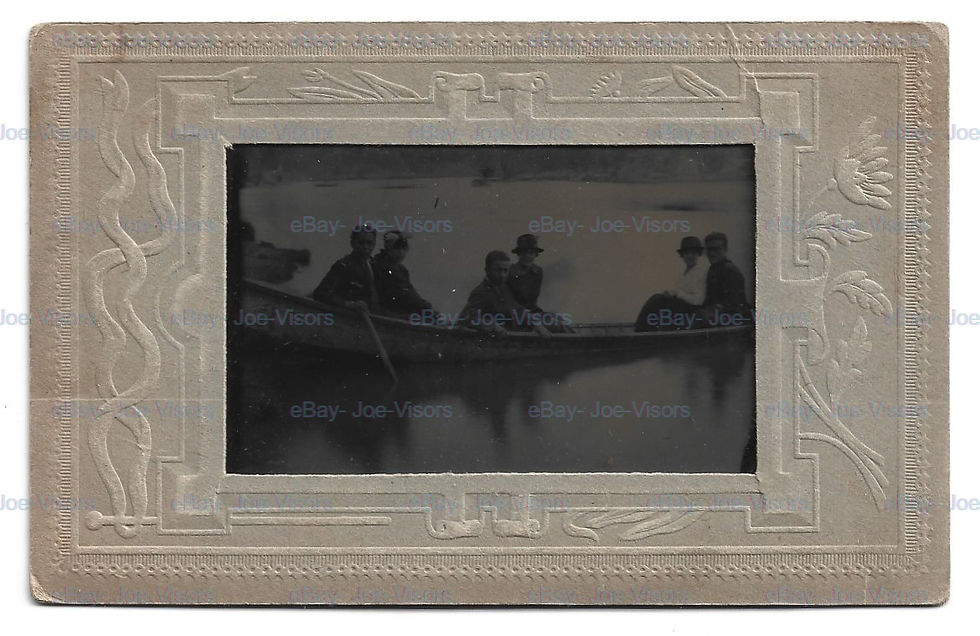 Vintage photo: Silhouetted figures in a rowboat