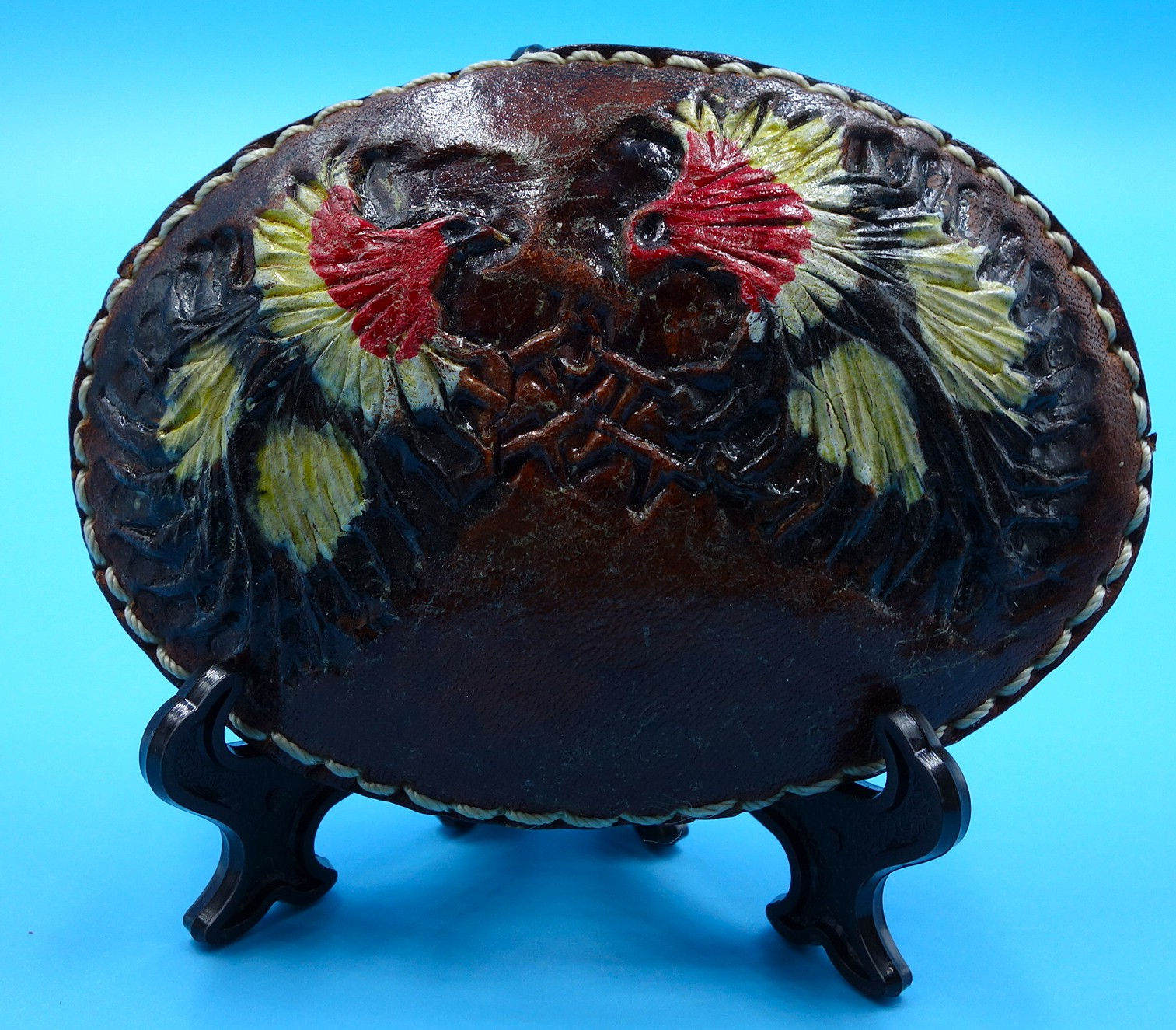 Tooled leather belt buckle with two eagles