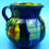 Thumbnail: Hand-painted ceramic pitcher, blue, yellow, green