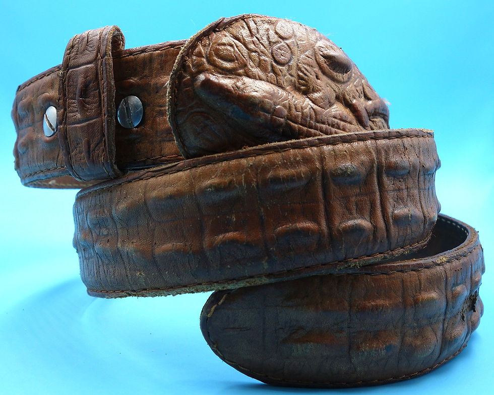 Brown leather belt with alligator texture and ornate buckle