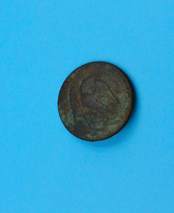 Vintage copper coin, aged patina