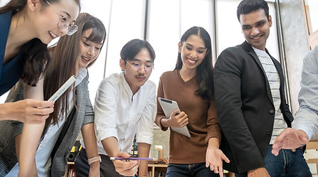A multi-racial team engaging in a discussion