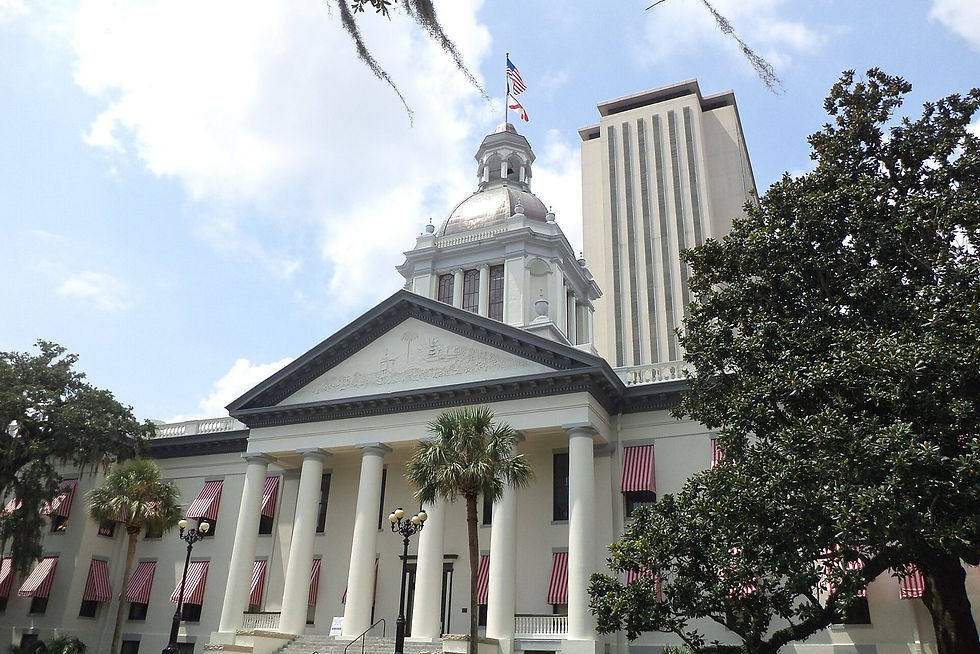 Florida's Historic Capitol, with the Florida State Capitol tower behind it, in Tallahassee, Fla