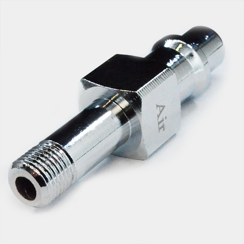 Conector metálico plateado con la palabra Air, Acople Ohmeda para Oxígeno. Ref 6700-0518-800.