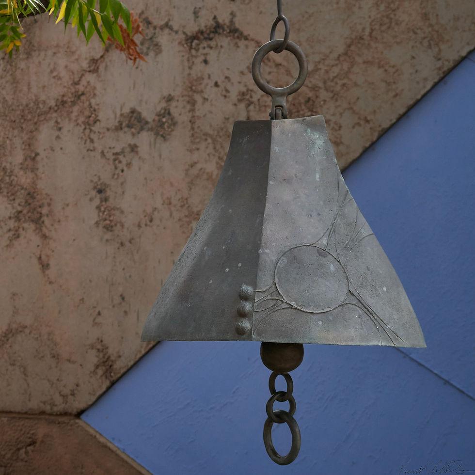 Brass bell from Arcosanti hanging
